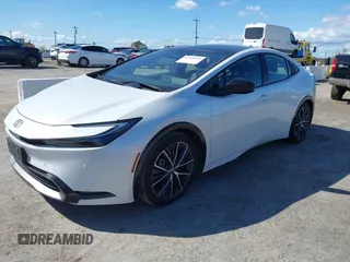 2023 Toyota Prius LE with VIN JTDACAAUXP3012538, listed as a IAAI auction lot 41948103 with 33,338 mi miles and . Bid and sale history available at DreamBid. Image 17.