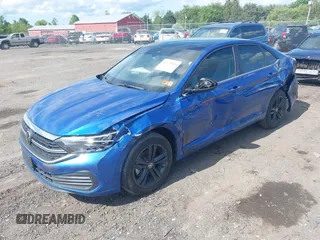 2024 Volkswagen Jetta SE with VIN 3VW7M7BU8RM067013, listed as a IAAI auction lot 42179920 with 32,418 mi miles and . Bid and sale history available at DreamBid. Image 2.