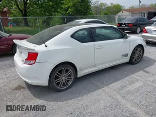 2012 Scion tC with VIN JTKJF5C73C3041792, listed as a IAAI auction lot 42117978 with 111,815 mi miles. Bid and sale history available at carsss.com. Image 4.