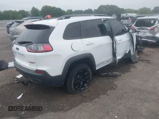 2021 Jeep Cherokee Trailhawk with VIN 1C4PJMBX4MD239112, listed as a IAAI auction lot 42271040 with 62,917 mi miles and . Bid and sale history available at DreamBid. Image 4.