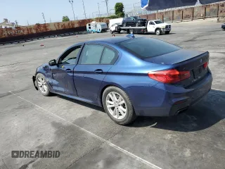 2019 BMW 5 Series M550i xDrive with VIN WBAJB9C51KB464722, listed as a Copart auction lot 53575135 with 70,187 mi miles and Salvage title. Bid and sale history available at DreamBid. Image 2.