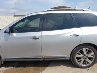 2015 Nissan Pathfinder S with VIN 5N1AR2MM6FC720408, listed as a IAAI auction lot 42752896 with 203,795 mi miles and . Bid and sale history available at DreamBid. Image 14.