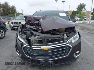 2018 Chevrolet Traverse LT Cloth with VIN 1GNERGKW0JJ263209, listed as a IAAI auction lot 42294170 with 115,619 mi miles and . Bid and sale history available at DreamBid. Image 13.