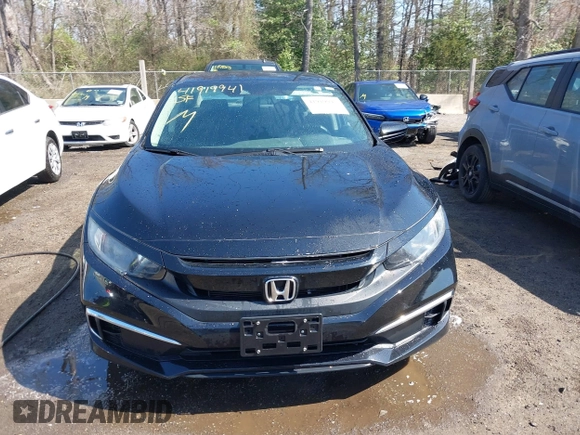 2020 Honda Civic LX with VIN 2HGFC2F69LH532499, listed as a IAAI auction lot 41919941 with 96,936 mi miles and . Bid and sale history available at DreamBid. Image 13.