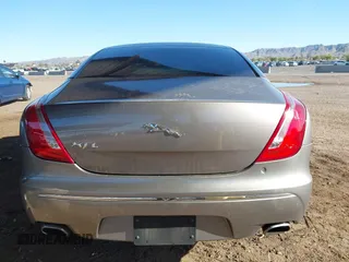 2011 Jaguar XJ XJL with VIN SAJWA2GB0BLV13469, listed as a IAAI auction lot 41836620 with 115,924 mi miles and . Bid and sale history available at DreamBid. Image 17.