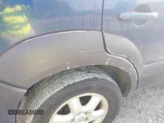 2005 Hyundai Tucson GLS with VIN KM8JN72D25U062364, listed as a IAAI auction lot 42247915 with 214,068 mi miles and . Bid and sale history available at DreamBid. Image 12.