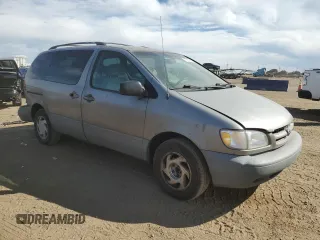 1999 Toyota Sienna LE with VIN 4T3ZF13C4XU142973, listed as a Copart auction lot 49983595 with 206,265 mi miles and Salvage Title. Bid and sale history available at carsss.com. Image 4.