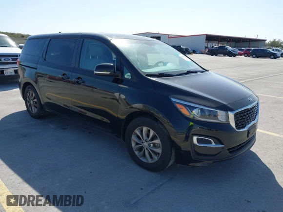2020 Kia Sedona EX with VIN KNDMB5C18L6581794, listed as a IAAI auction lot 41767614 with 131,009 mi miles. Bid and sale history available at carsss.com. Image 1.