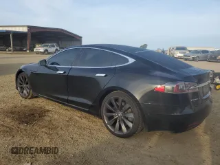 2017 Tesla Model S 100D with VIN 5YJSA1E27HF185487, listed as a Copart auction lot 47979455 with 184,987 mi miles and Salvage Title. Bid and sale history available at DreamBid. Image 2.