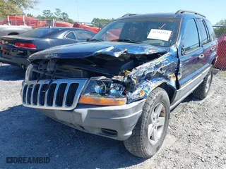 2001 Jeep Grand Cherokee Laredo with VIN 1J4GW48S91C721227, listed as a IAAI auction lot 41792524 with 229,973 mi miles. Bid and sale history available at carsss.com. Image 6.