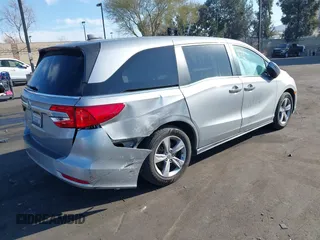 2018 Honda Odyssey EX-L with VIN 5FNRL6H71JB089289, listed as a IAAI auction lot 41813322 with 94,933 mi miles and . Bid and sale history available at DreamBid. Image 4.