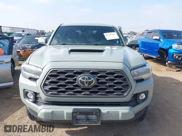 2022 Toyota Tacoma SR5 z VIN 3TMBZ5DN3NM034388, wystawiony jako IAAI lot #42270543 z przebiegiem 179 904 mil mil oraz . Historia ofert i sprzedaży dostępna na DreamBid. Obrazek 12.