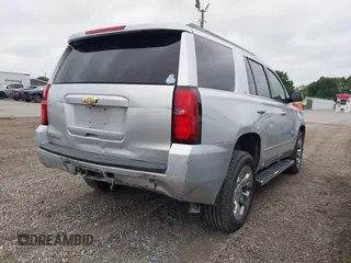 2019 Chevrolet Tahoe LT z VIN 1GNSCBKC1KR191789, wystawiony jako IAAI lot #42144961 z przebiegiem 94 178 mil mil oraz . Historia ofert i sprzedaży dostępna na DreamBid. Obrazek 4.
