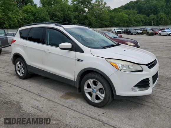2013 Ford Escape SE with VIN 1FMCU9G9XDUA92061, listed as a Copart auction lot 63074655 with 150,848 mi miles and Salvage title. Bid and sale history available at DreamBid. Image 4.