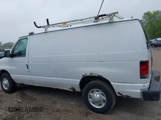 2012 Ford Econoline Cargo Commercial z VIN 1FTNE2EL7CDB36239, wystawiony jako IAAI lot #42311374 z przebiegiem 152 547 mil mil oraz . Historia ofert i sprzedaży dostępna na DreamBid. Obrazek 14.