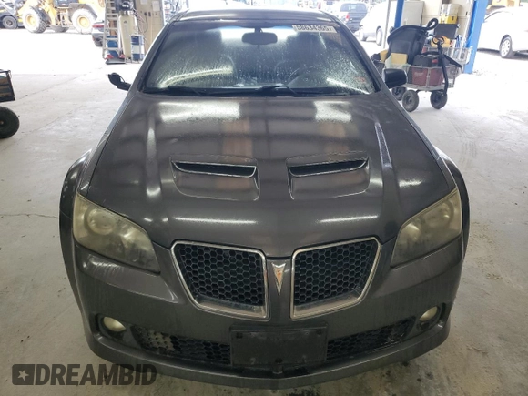 2009 Pontiac G8 z VIN 6G2ER57769L192376, wystawiony jako Copart lot #58634365 z przebiegiem 206 095 mil mil oraz Tytuł czysty. Historia ofert i sprzedaży dostępna na DreamBid. Obrazek 5.