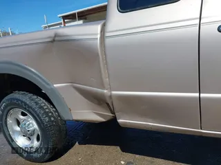 1998 Ford Ranger XL with VIN 1FTZR15X2WTA29628, listed as a IAAI auction lot 41972607 with 149,628 mi miles. Bid and sale history available at carsss.com. Image 17.