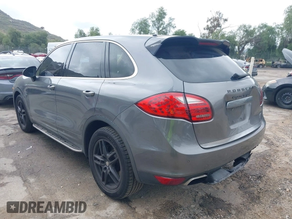2012 Porsche Cayenne S Hybrid with VIN WP1AE2A25CLA90636, listed as a IAAI auction lot 41922089 with 90,318 mi miles and . Bid and sale history available at DreamBid. Image 3.