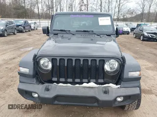 2018 Jeep Wrangler Sport S with VIN 1C4GJXAG0JW224562, listed as a IAAI auction lot 41327316 with 68,761 mi miles and . Bid and sale history available at DreamBid. Image 12.