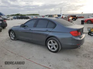2015 BMW 3 Series 320i with VIN WBA3B1G50FNT06526, listed as a Copart auction lot 50735865 with 128,001 mi miles and Salvage Title. Bid and sale history available at carsss.com. Image 2.