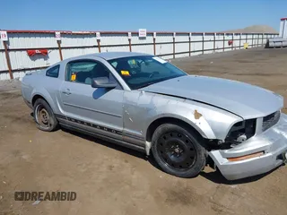 2008 Ford Mustang Deluxe with VIN 1ZVHT80N785208831, listed as a IAAI auction lot 42181679 with Not Provided miles. Bid and sale history available at carsss.com. Image 1.