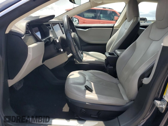 2014 Tesla Model S 60 with VIN 5YJSA1H12EFP61355, listed as a Copart auction lot 59709065 with 109,446 mi miles and Salvage title. Bid and sale history available at DreamBid. Image 7.