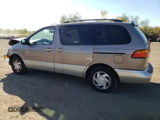 1998 Toyota Sienna LE with VIN 4T3ZF13C5WU049992, listed as a Copart auction lot 74492774 with 174,751 mi miles and Salvage Title. Bid and sale history available at carsss.com. Image 2.