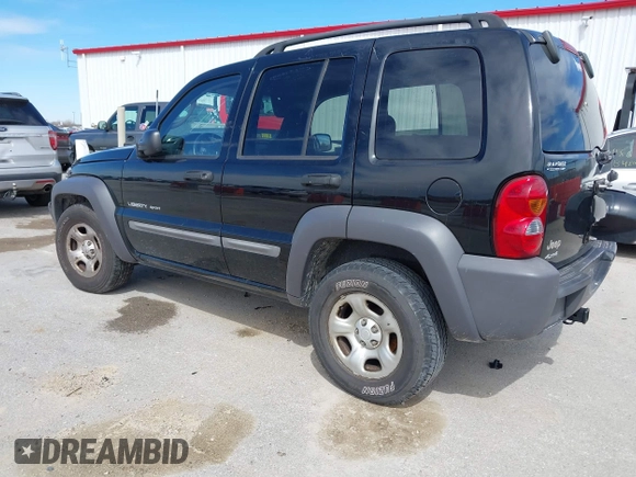 2003 Jeep Liberty Sport with VIN 1J4GL48KX3W530569, listed as a IAAI auction lot 41857397 with 172,303 mi miles. Bid and sale history available at carsss.com. Image 3.