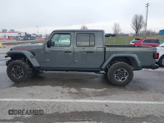 2022 Jeep Gladiator Mojave z VIN 1C6JJTEG8NL130971, wystawiony jako IAAI lot #41163074 z przebiegiem 47 142 mil mil oraz . Historia ofert i sprzedaży dostępna na DreamBid. Obrazek 15.