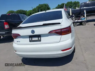 2019 Volkswagen Jetta S z VIN 3VWCB7BU9KM144272, wystawiony jako IAAI lot #41997518 z przebiegiem 91 950 mil mil oraz . Historia ofert i sprzedaży dostępna na DreamBid. Obrazek 16.