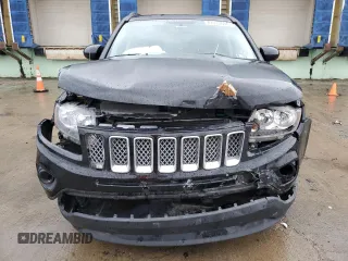2016 Jeep Compass Latitude with VIN 1C4NJCEB7GD664653, listed as a Copart auction lot 87313664 with 64,580 mi miles and Salvage Title. Bid and sale history available at carsss.com. Image 5.