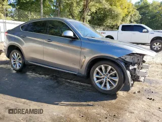 2015 BMW X6 sDrive35i with VIN 5UXKU0C57F0F91930, listed as a Copart auction lot 75622864 with 145,516 mi miles and Salvage Title. Bid and sale history available at carsss.com. Image 4.