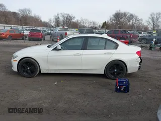 2013 BMW 3 Series 328i xDrive with VIN WBA3B5G5XDNS02162, listed as a IAAI auction lot 41484578 with 132,211 mi miles. Bid and sale history available at carsss.com. Image 14.