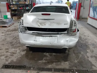 2012 Chrysler 300 with VIN 2C3CCAET0CH188519, listed as a IAAI auction lot 40894686 with 101,980 mi miles. Bid and sale history available at carsss.com. Image 18.