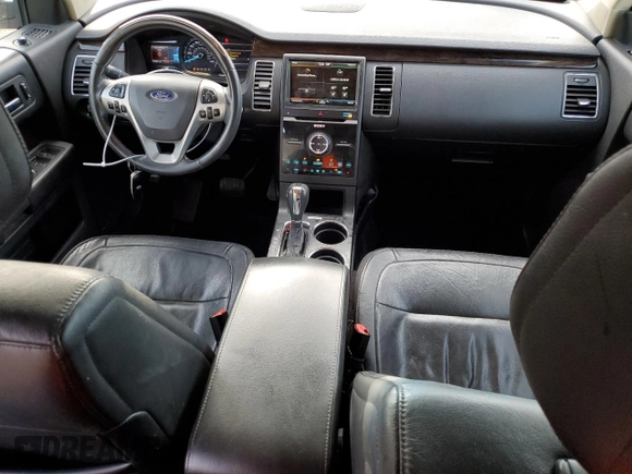 2014 Ford Flex Limited z VIN 2FMGK5D89EBD10509, wystawiony jako Copart lot #57614265 z przebiegiem 174 650 mil mil oraz Szkoda całkowita • Salvage title. Historia ofert i sprzedaży dostępna na DreamBid. Obrazek 8.