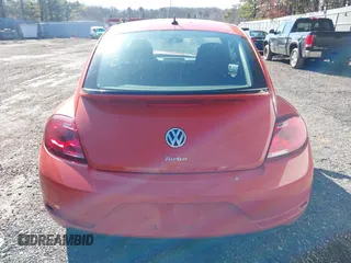 2017 Volkswagen Beetle 1.8T Fleet with VIN 3VWF17AT7HM618771, listed as a IAAI auction lot 41595088 with 67,943 mi miles. Bid and sale history available at carsss.com. Image 16.