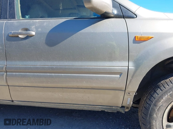 2008 Honda Pilot EX-L with VIN 5FNYF18778B052859, listed as a IAAI auction lot 41695095 with 249,207 mi miles and . Bid and sale history available at DreamBid. Image 13.