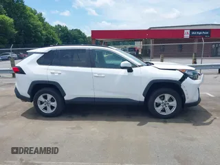 2019 Toyota RAV4 XLE with VIN 2T3P1RFV0KC008652, listed as a IAAI auction lot 42508557 with 87,684 mi miles and . Bid and sale history available at DreamBid. Image 13.