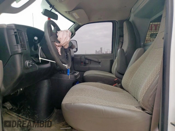 2020 Chevrolet Express Cargo with VIN 1GCWGAFP7L1127228, listed as a Copart auction lot 58584465 with 83,826 mi miles and Salvage title. Bid and sale history available at DreamBid. Image 7.