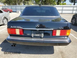 1990 Mercedes-Benz 420 with VIN WDBCA35E6LA549912, listed as a Copart auction lot 69108464 with 302,188 mi miles and Salvage Title. Bid and sale history available at carsss.com. Image 6.