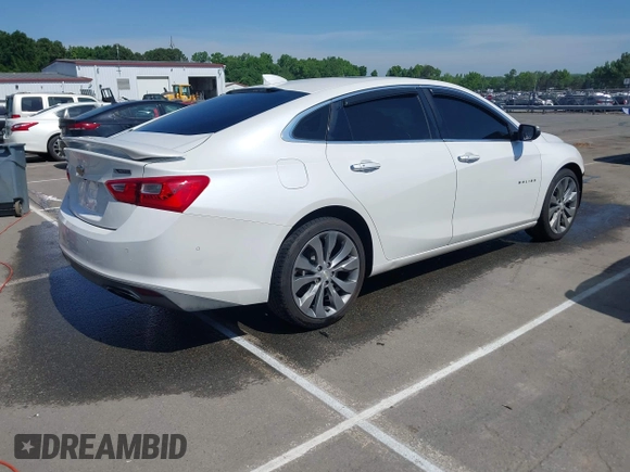 2016 Chevrolet Malibu Premier with VIN 1G1ZH5SX6GF265089, listed as a IAAI auction lot 42148876 with 127,497 mi miles and . Bid and sale history available at DreamBid. Image 4.