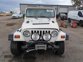1999 Jeep Wrangler Sport with VIN 1J4FY19S2XP421162, listed as a Copart auction lot 57683835 with 152,636 mi miles and Salvage title. Bid and sale history available at DreamBid. Image 5.