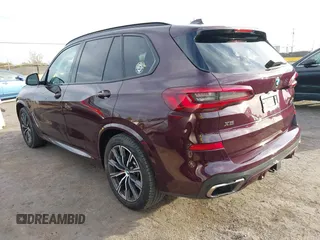 2021 BMW X5 M50i with VIN 5UXJU4C04M9G03418, listed as a IAAI auction lot 40705167 with 24,073 mi miles and . Bid and sale history available at DreamBid. Image 3.