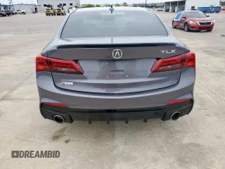 2020 Acura TLX w/A-Spec Pkg z VIN 19UUB1F67LA009162, wystawiony jako Copart lot #51239205 z przebiegiem 97 200 mil mil oraz Szkoda całkowita • Salvage title. Historia ofert i sprzedaży dostępna na DreamBid. Obrazek 6.