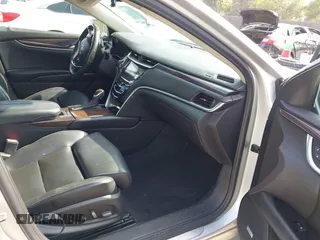 2014 Cadillac XTS Luxury with VIN 2G61N5S30E9294994, listed as a IAAI auction lot 42617654 with 159,573 mi miles and . Bid and sale history available at DreamBid. Image 5.