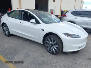 2024 Tesla Model 3 with VIN 5YJ3E1EA6RF751009, listed as a IAAI auction lot 40537919 with 1 mi miles. Bid and sale history available at carsss.com. Image 1.
