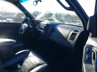 2002 Ford Escape Limited with VIN 1FMCU041X2KC74197, listed as a IAAI auction lot 41363369 with 153,704 mi miles. Bid and sale history available at carsss.com. Image 5.