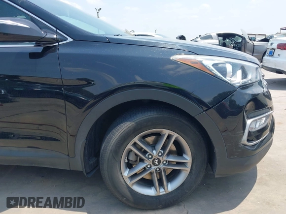 2017 Hyundai Santa Fe 2.4L with VIN 5NMZUDLBXHH022812, listed as a IAAI auction lot 42272430 with 76,121 mi miles and . Bid and sale history available at DreamBid. Image 6.