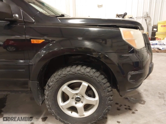 2007 Honda Pilot LX with VIN 5FNYF18117B009290, listed as a IAAI auction lot 41205310 with 150,081 mi miles. Bid and sale history available at carsss.com. Image 20.