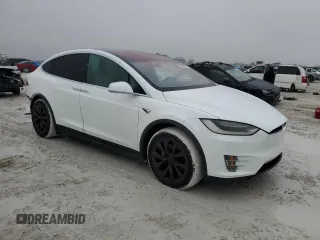 2017 Tesla Model X 90D z VIN 5YJXCBE22HF076134, wystawiony jako Copart lot #41828555 z przebiegiem 214 443 mil mil oraz Szkody całkowita. Historia ofert i sprzedaży dostępna na DreamBid. Obrazek 4.